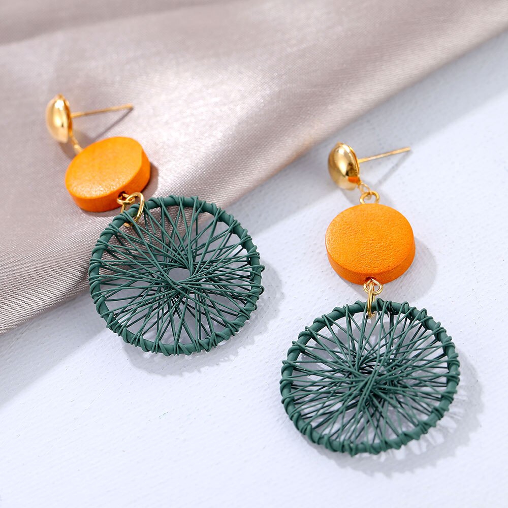 Khuyên tai dáng dài mặt hình tròn đan chéo phong cách bohomian