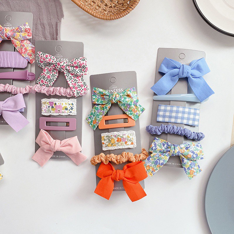 Kẹp tóc vải hình nơ họa tiết hoa ngọt ngào cho nữ