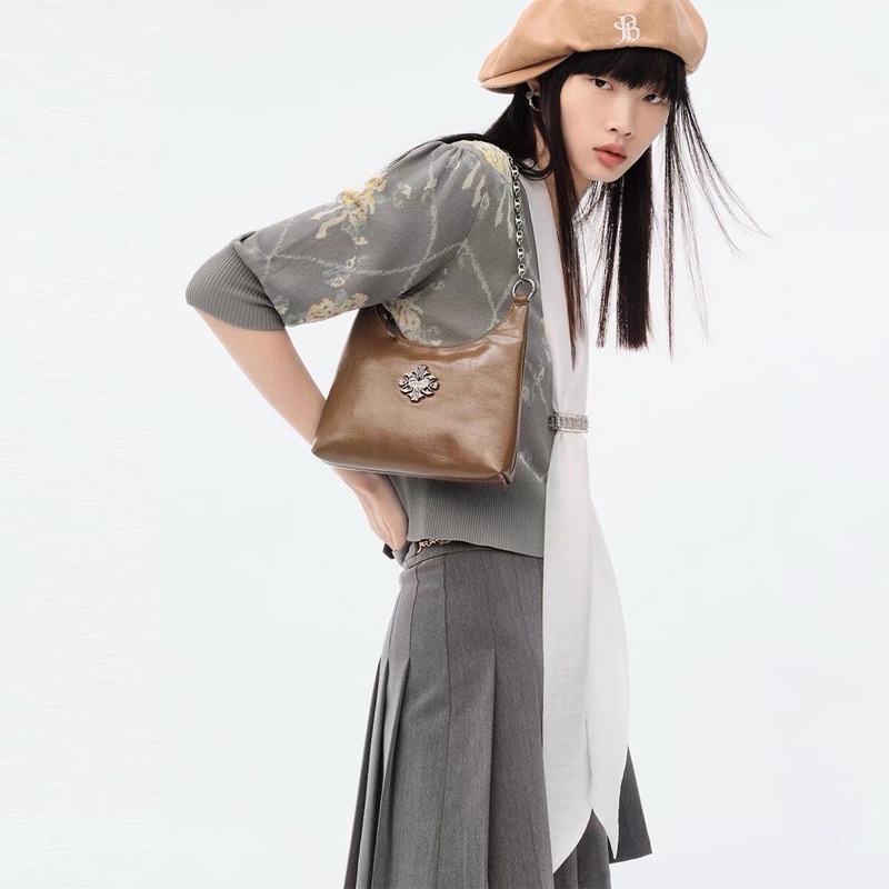 Áo cardigan len Peacebird