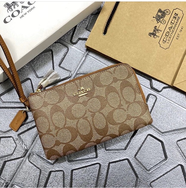 Ví hai ngăn Coach cầm tay