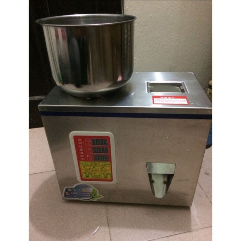 Máy cân định lượng