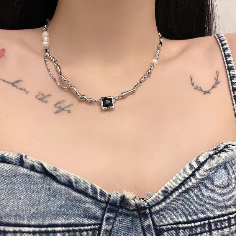 Dây chuyền chuỗi đính ngọc trai phong cách hip hop cá tính