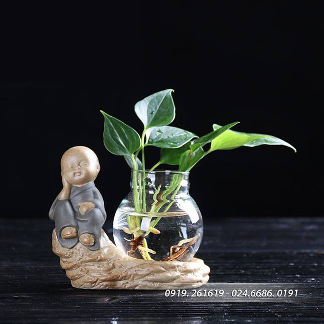 Tượng 4 không an lạc kèm bình hoa