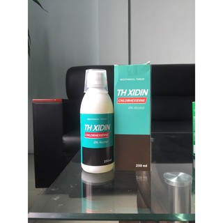 Nước súc miệng, nước súc họng TH Xidin, THxidin đóng chai 250ml trong hộp.