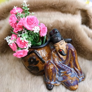 Chậu tượng trồng cây Lý bạch say
