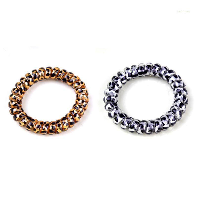 Dây Cột Tóc Lò Xo Bằng Nhựa Họa Tiết Da Báo 2 Màu Lấp Lánh Cho Nữ