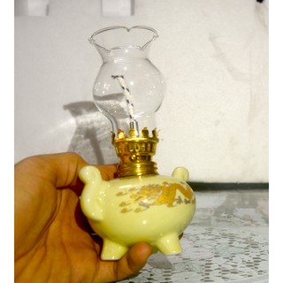 Đèn dầu sứ rồng vàng