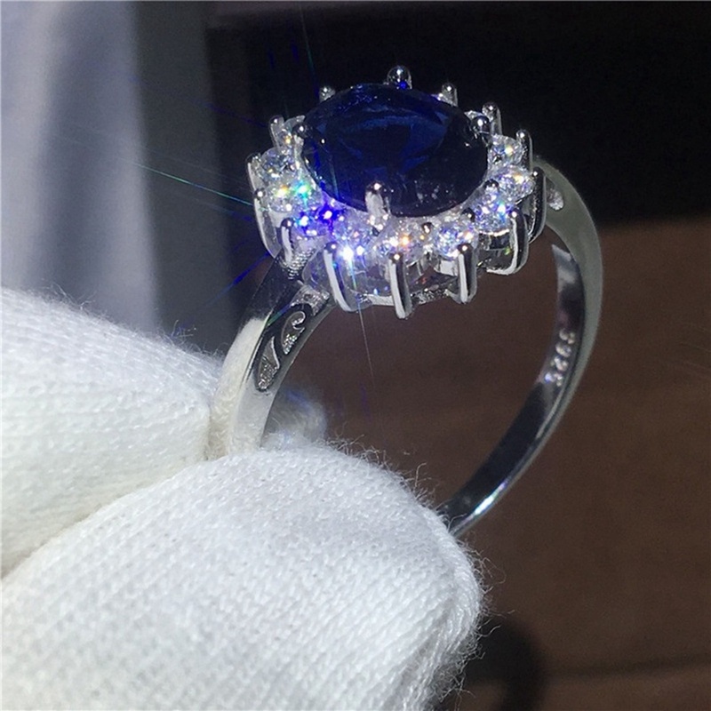 Nhẫn đính hôn đính đá Sapphire kiểu hoàng gia