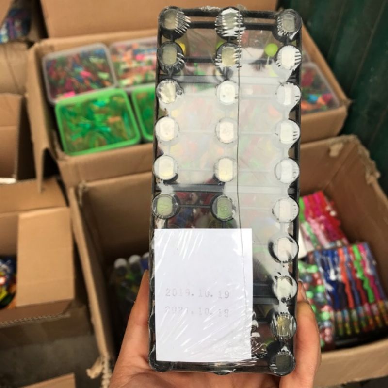 Kẹo xê kèm súng tạch đồ chơi