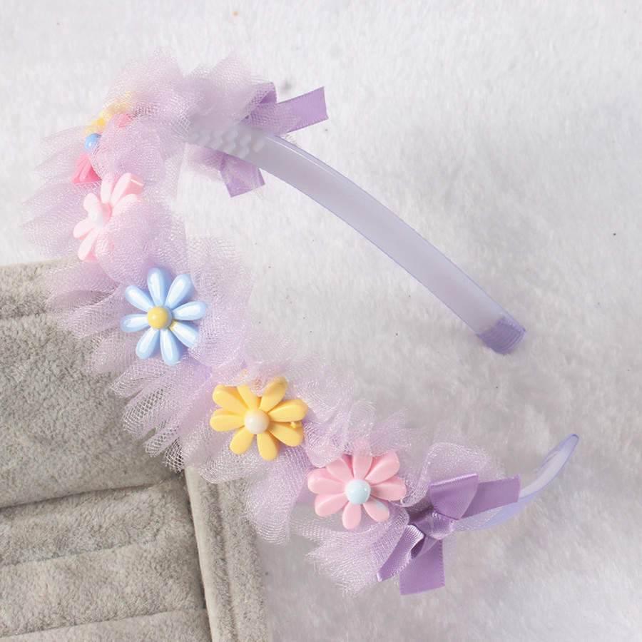 Cài tóc đính hoa xinh xắn cho bé gái