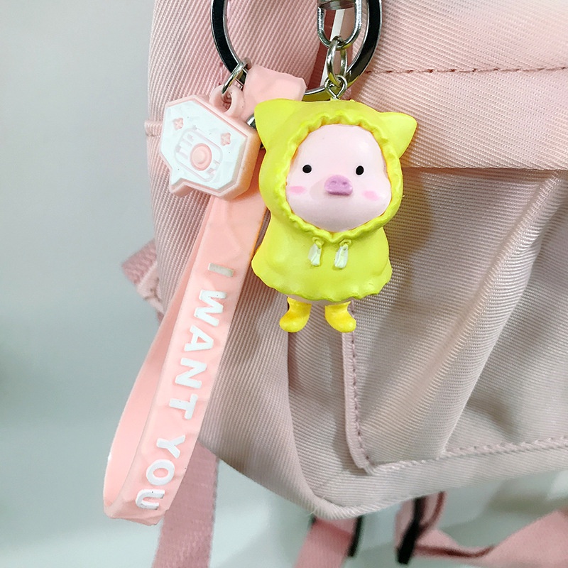 Hoạt Hình Móc Khóa Nhựa Hình Chú Heo Mặc Áo Mưa Dễ Thương