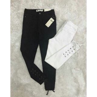 Quần jeans đan dây chân