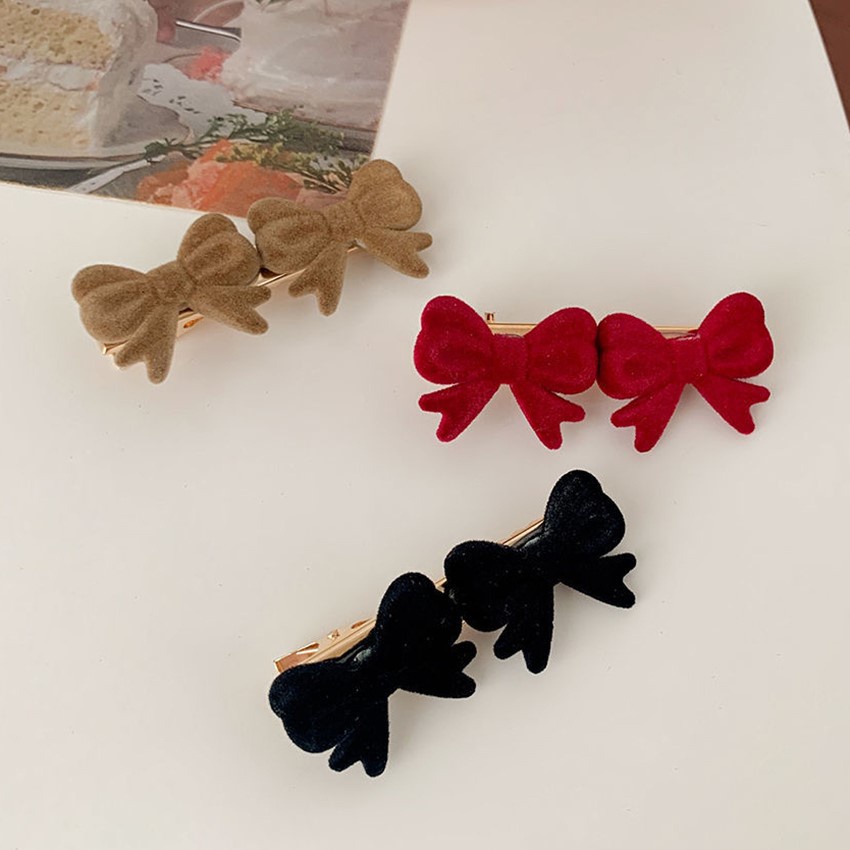 Kẹp tóc hình nơ xinh xắn cho nữ