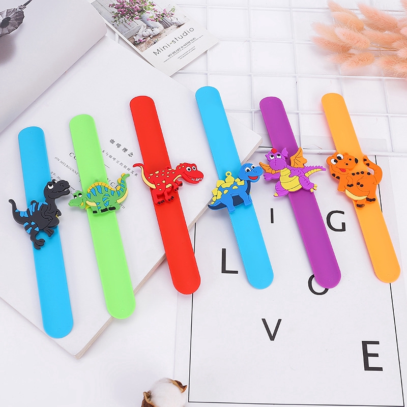 Vòng đeo tay bằng chất liệu cao su silicon PVC mềm hình khủng long xinh xắn dành cho các bé
