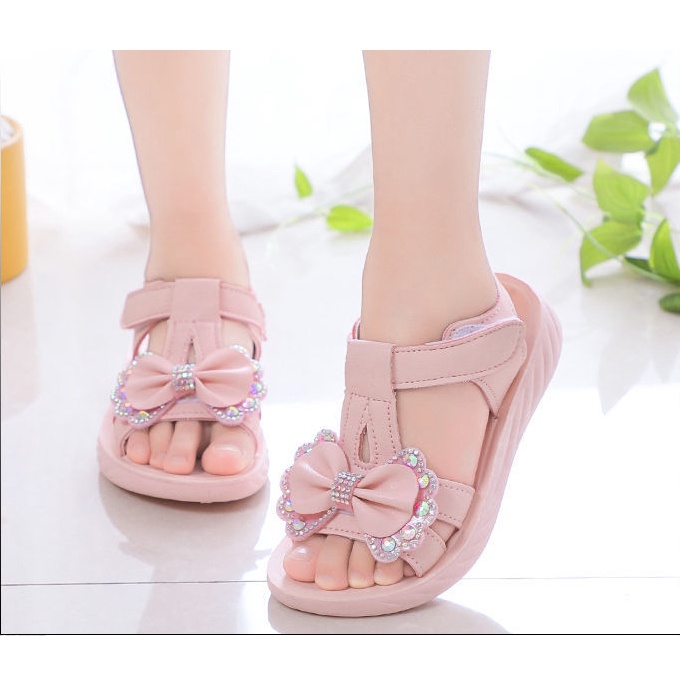 sandal bé gái đính nơ đế êm da mềm sd26