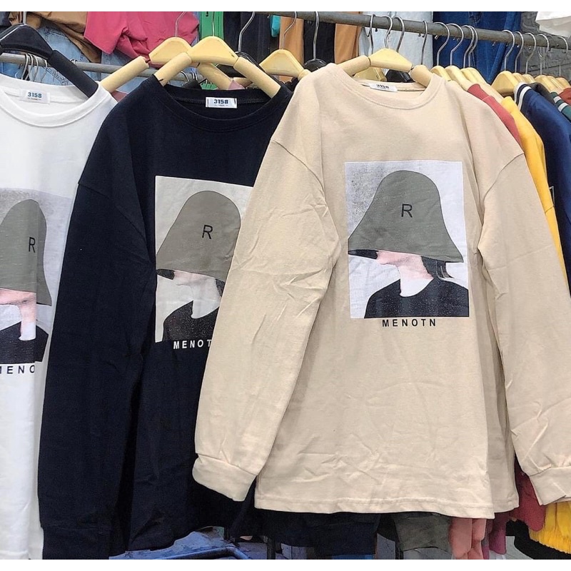 Áo phông dài tay cô gái đội mũ