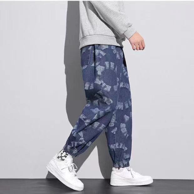 Quần Jeans Ống Túm Dáng Rộng In Chữ Graffiti Thời Trang Unisex 2021