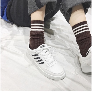 Giày sneaker độn đế nữ