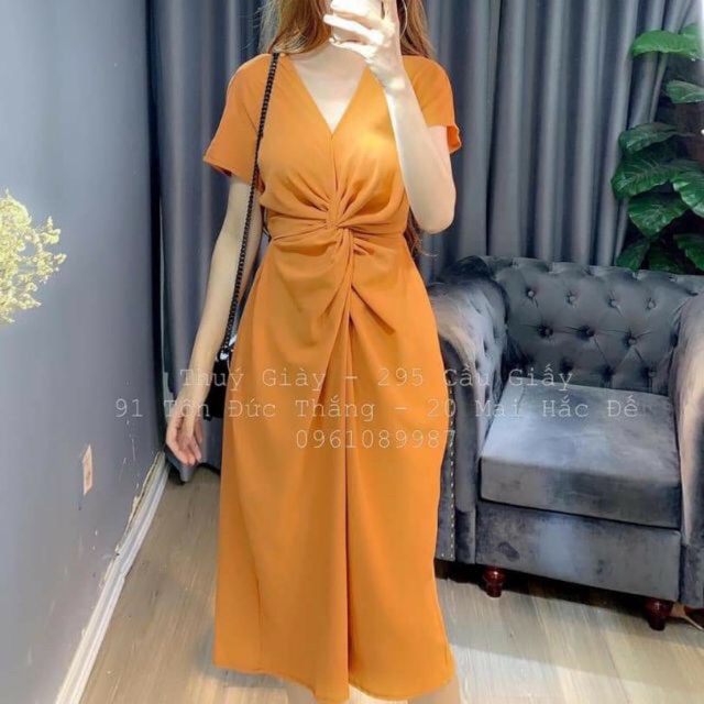 Đầm xoắn eo