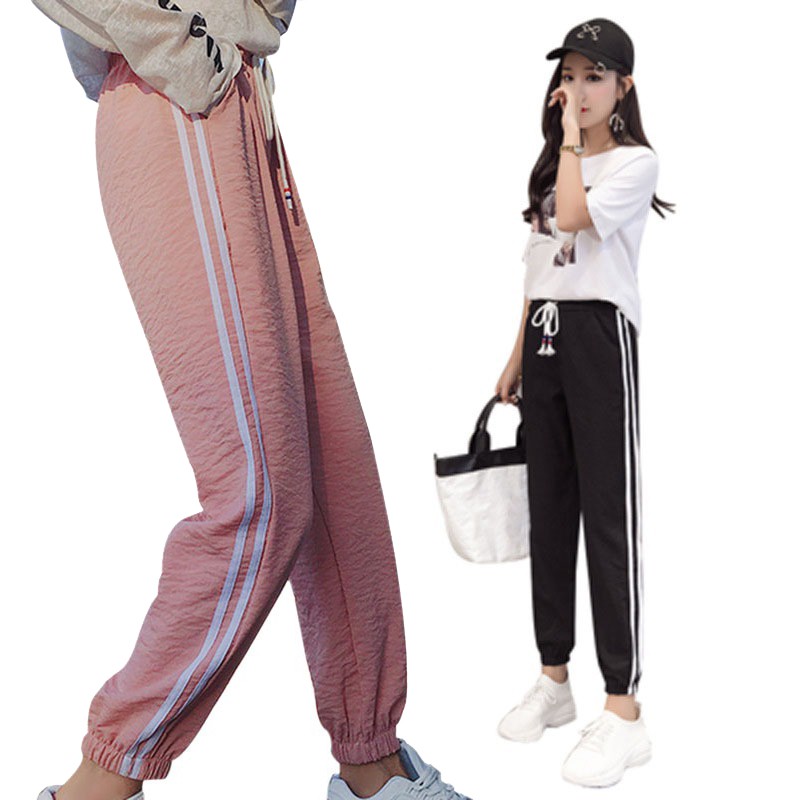 Quần jogger nữ kẻ sọc hai bên | WebRaoVat - webraovat.net.vn