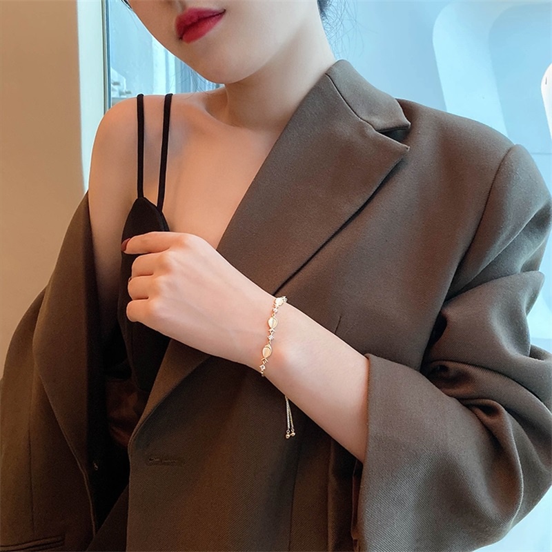 Vòng tay mặt hình cá nhỏ đính đá Opal có thể điều chỉnh cho nữ