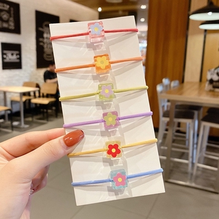 Dây buộc tóc cho bé đính hoa và dây chun cao su có tính co giãn đàn hồi cao với nhiều màu sắc tươi tắn sặc sỡ