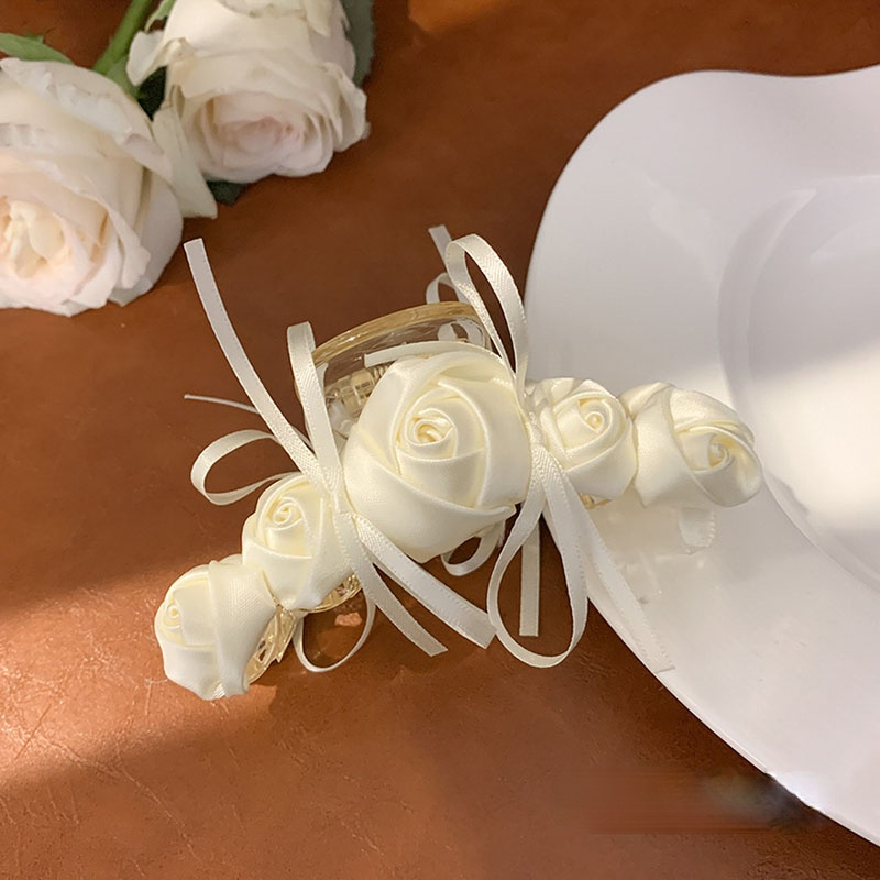 Three-dimensional rose bow lace gripper