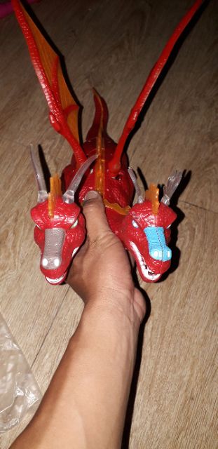 Khủng long chạy PIN 2 đầu có cánh và đẻ trứng có nhạc đèn Led tặng kèm PIN