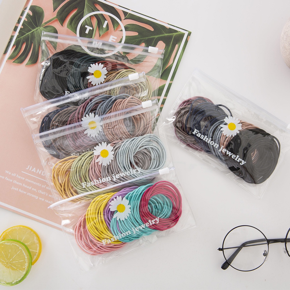 Set 100 dây buộc tóc hàn quốc NHIỀU MÀU loại TÚI ZIP HOA CÚC