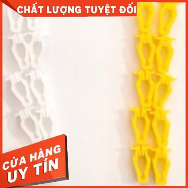Nút cài dàn áo xe máy