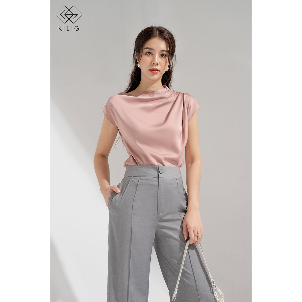Áo sơ mi lụa thiết kế lệch vai, mix & match với các kiểu dáng quần hay chân váy đều phù hợp
