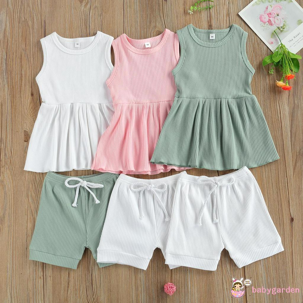 Bộ áo không tay cổ tròn và quần short bằng vải thun gân cho bé gái từ 2-7t