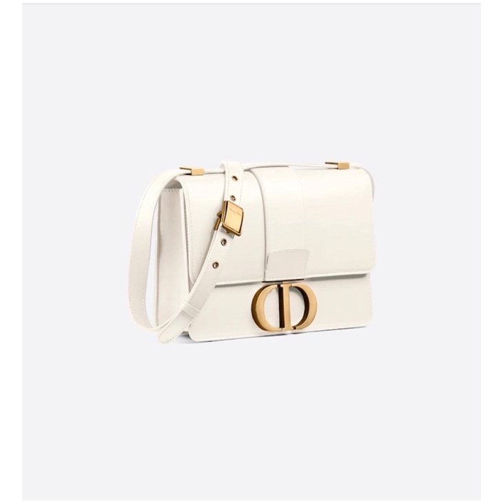 Túi trắng khoá vàng da trơn