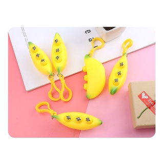 Móc khoá squishy quả chuối bóp ra mặt cười