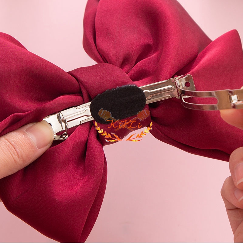 Kẹp tóc hình nơ xinh xắn dành cho nữ