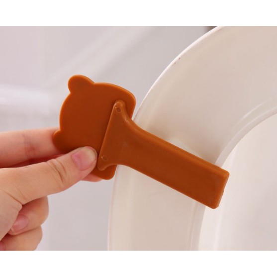 Miếng nhấc nắp bàn ngồi toilet ( giá bán 1 cái )