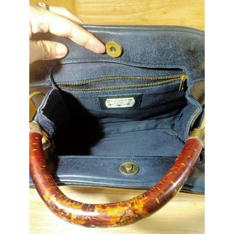 Túi xách da thật dày secondhand  180909