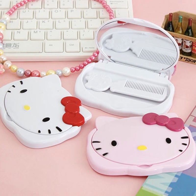 Gương mini trang điểm hello kitty có nơ kèm lược bỏ túi dễ thương bằng nhựa