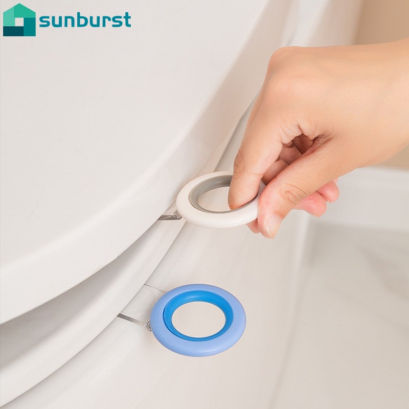 Dụng cụ mở nắp bồn cầu thiết kế tự dính an toàn tiện dụng