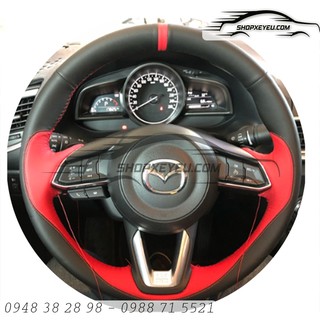 Da bọc vô lăng mazda đời facelift