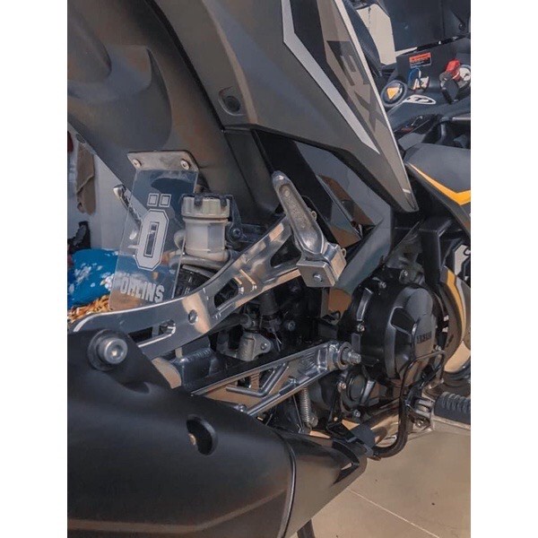 Gác chân Ex 150, Gác chân sau Exciter 150 kiểu Thailand gắn Pô Zin phụ kiện Exciter 150