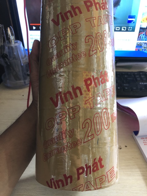 Băng keo 200y trong và Đục 1cây 6 cuộn 1kg8