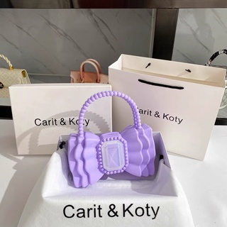 Ví carit & koty tím pastel đi tiệc sang chảnh