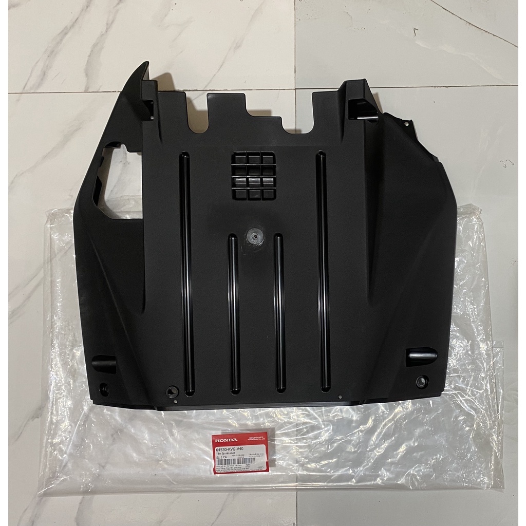 Tấm ốp sàn dưới - Sàn năm HONDA AIR BLADE năm 2011. (64530KVGV40)
