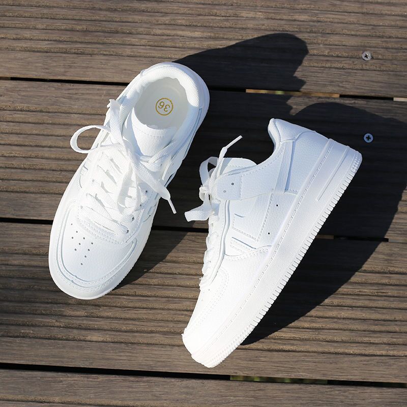 Giày sneaker màu trắng kiểu dáng retro dễ phối đồ cho nữ | BigBuy360 - bigbuy360.vn