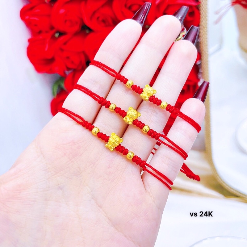 Charm hổ mix bi vàng 24 rết chỉ đỏ đeo tay