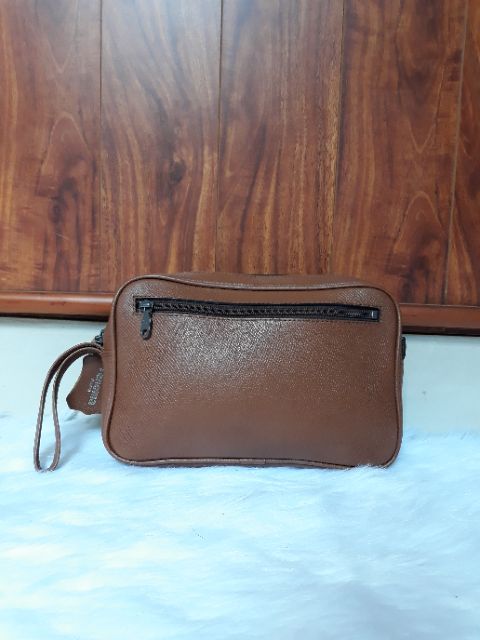 Túi cầm tay da thật