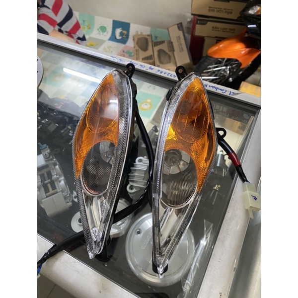 Mica cam gắn xi nhan zin ex 2005-2010