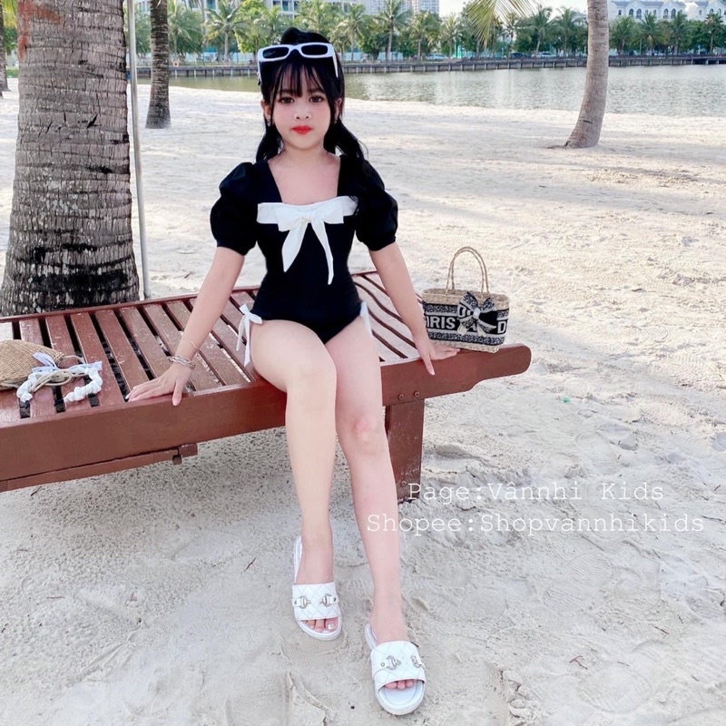 Bikini , đồ bơi liền thân nơ trắng bé gái