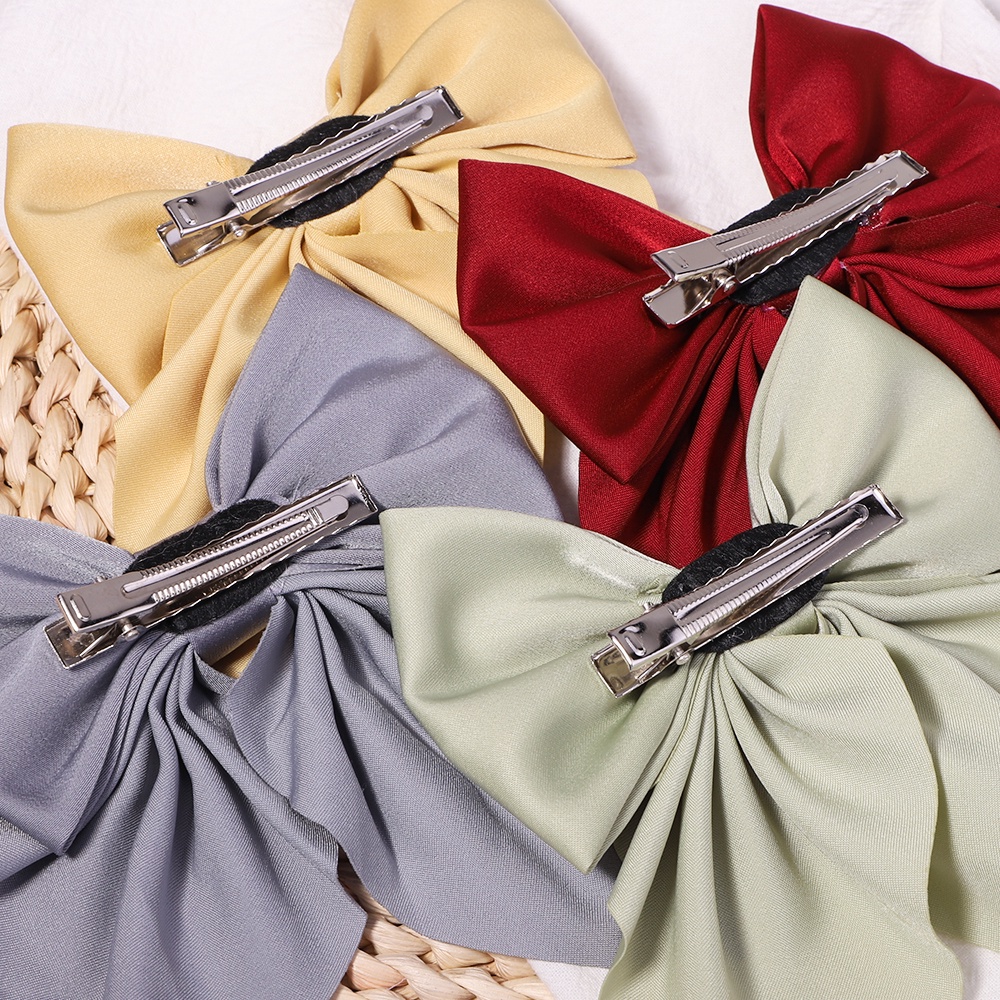 Kẹp tóc Kidsbows hình nơ satin màu trơn ngọt ngào cho bé gái